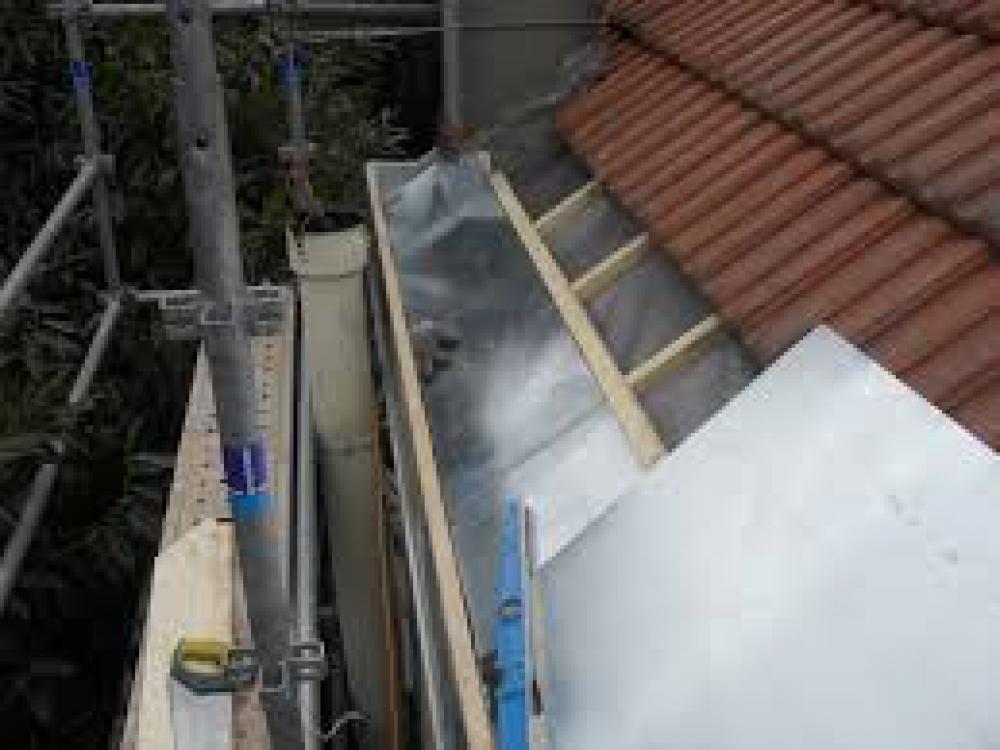   Installation et nettoyage de gouttière